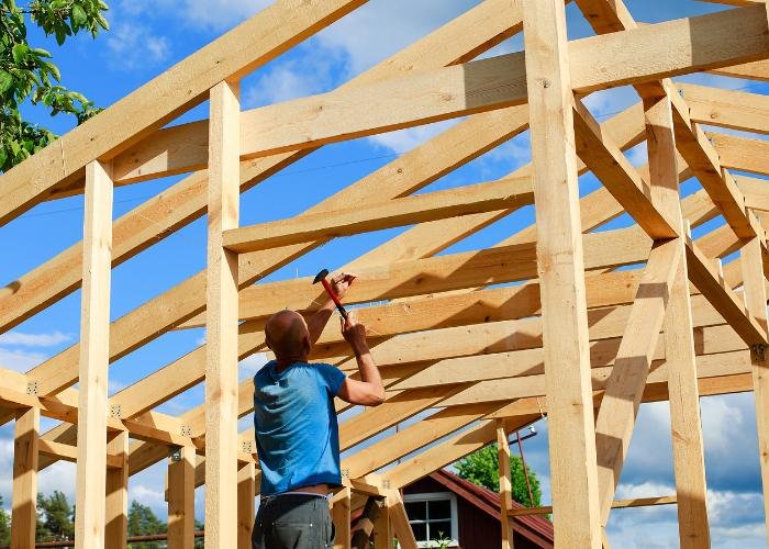 Professional framing crew working on new construction in San Diego